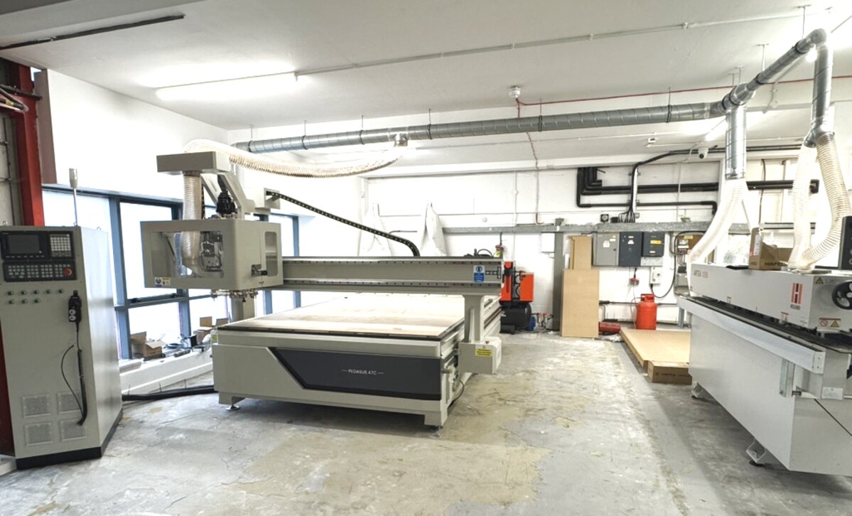YayYay in-house joinery workshop — Pegasus 3m × 2m CNC router and Holzher edgebander